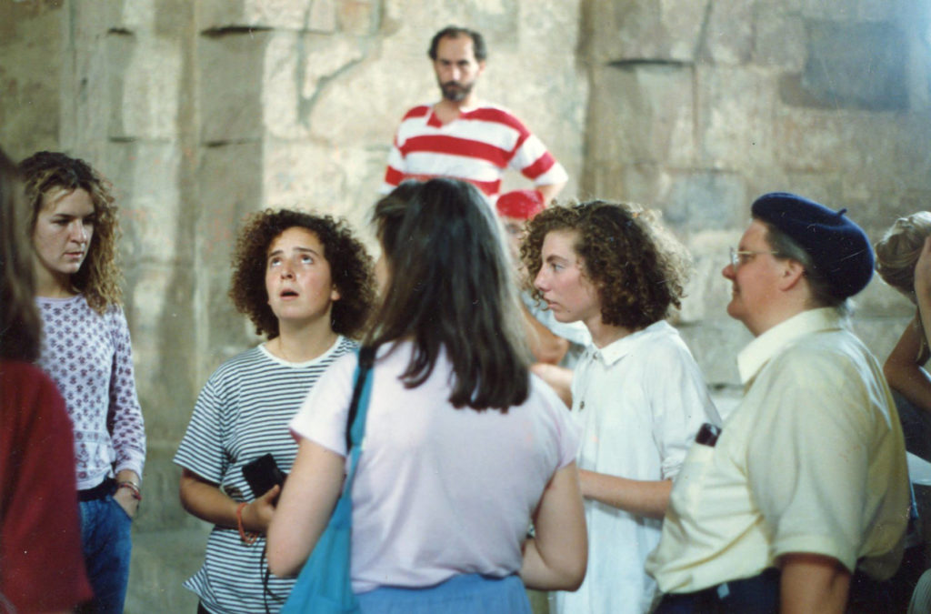 Students singing in Georgia chapel with Jennifer Greene.